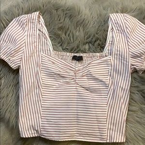 Red and cream blouse